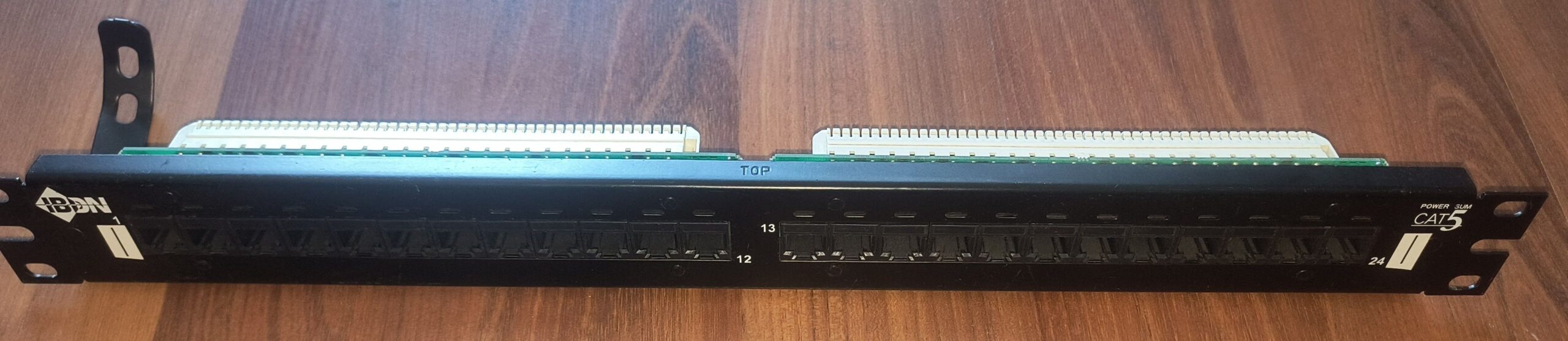 12-Port Cat 5e Patch Panel in Black color