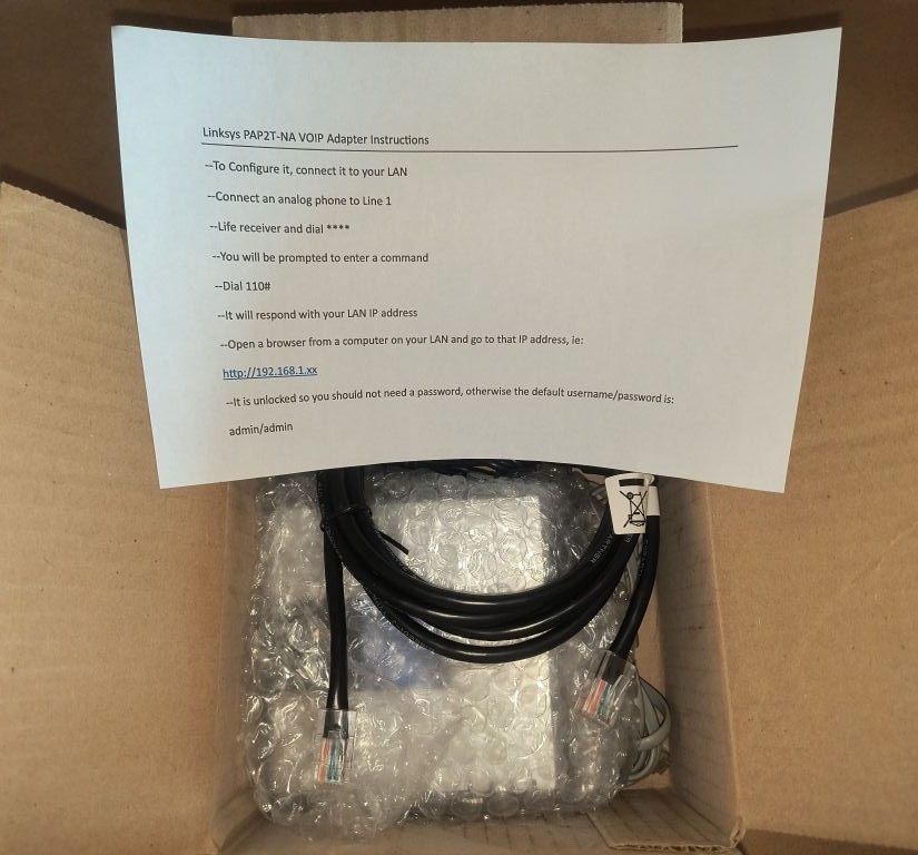 Linksys PAP2T-NA VOIP Phone Adapter - includes analog phone line, network cable and power adapter - Image 2
