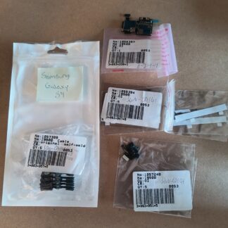 Assorted repair parts lot for Samsung Galaxy S4 - charging port, flex cables, adhesives